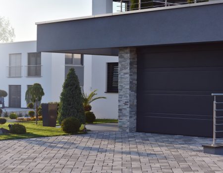 Garage,Of,A,Modern,European,House,With,An,Automatic,Door Garage,Of,A,Modern,European,House,With,An,Automatic,Door